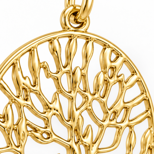 Close-up of Aurelia Tree of Life pendant showing polished gold-plated openwork branches and bail detail