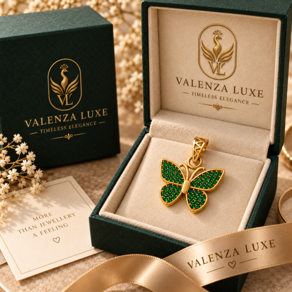 Mariposa Sovereign emerald butterfly pendant in a Valenza Luxe green jewelry gift box
