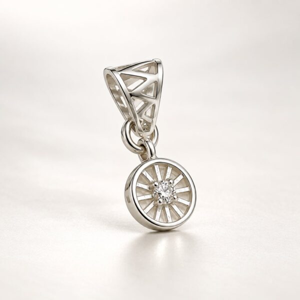 Angled view of Meridian Halo silver-tone geometric pendant with round clear stone and openwork bail