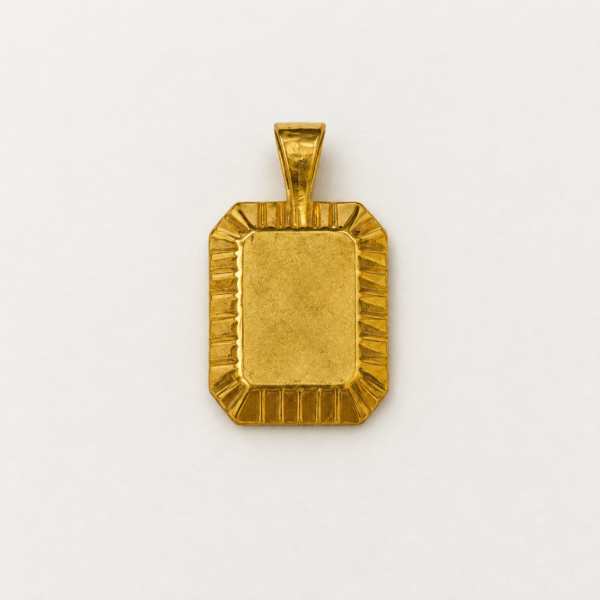 Back view of Polaris 18K gold vermeil rectangular medallion showing smooth flat reverse and fluted border