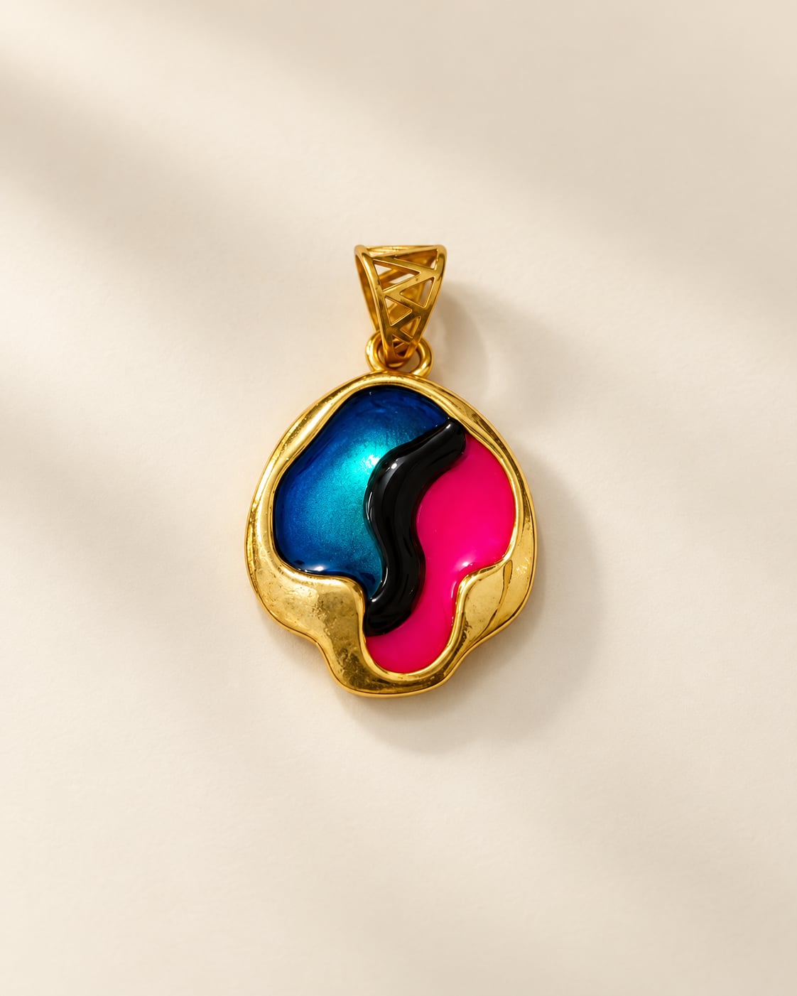 Aurora Muse multicolour gold-tone pendant featuring an abstract blue, pink and black design against an ivory background.