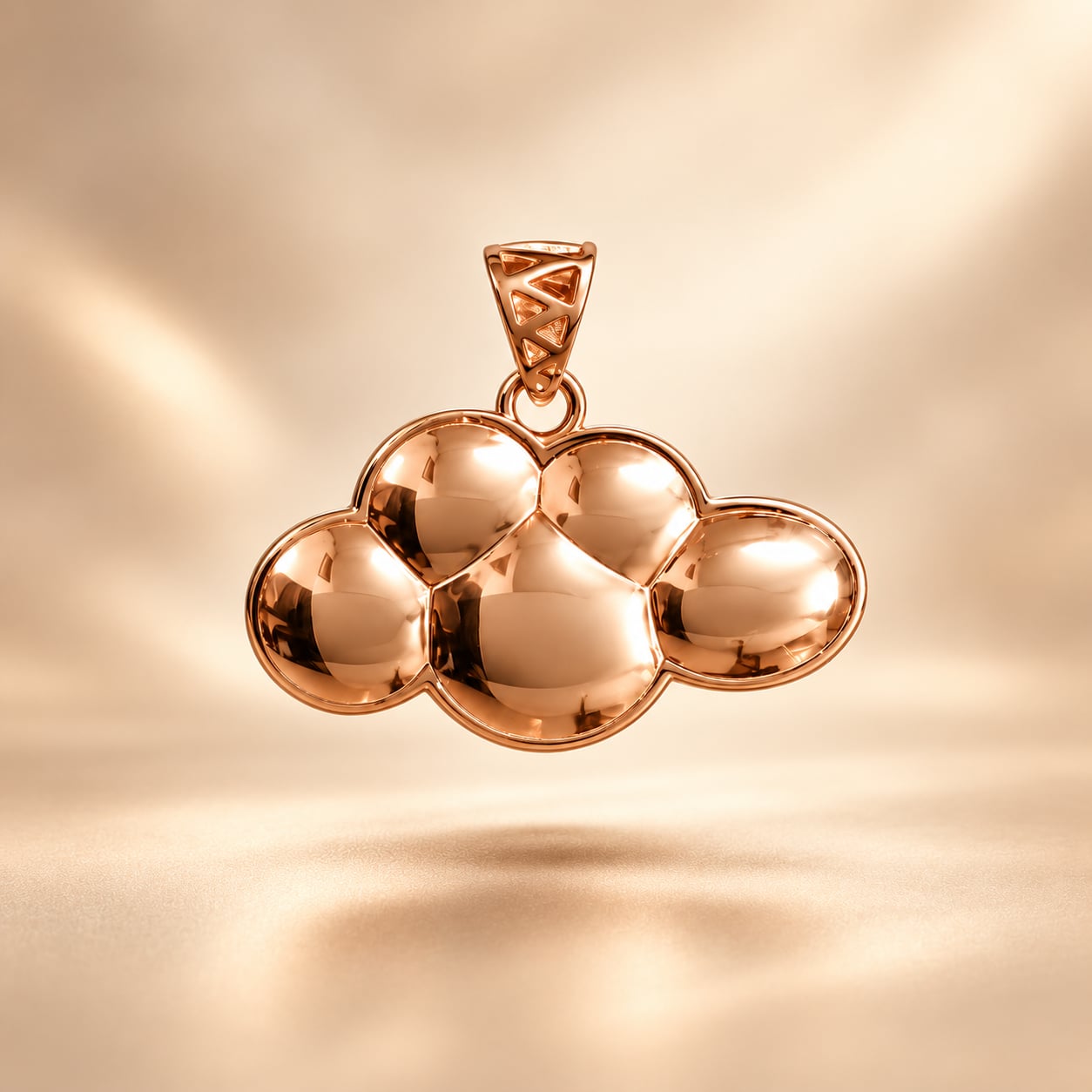 Cirrus Cloud rose gold pendant in a floating editorial product composition